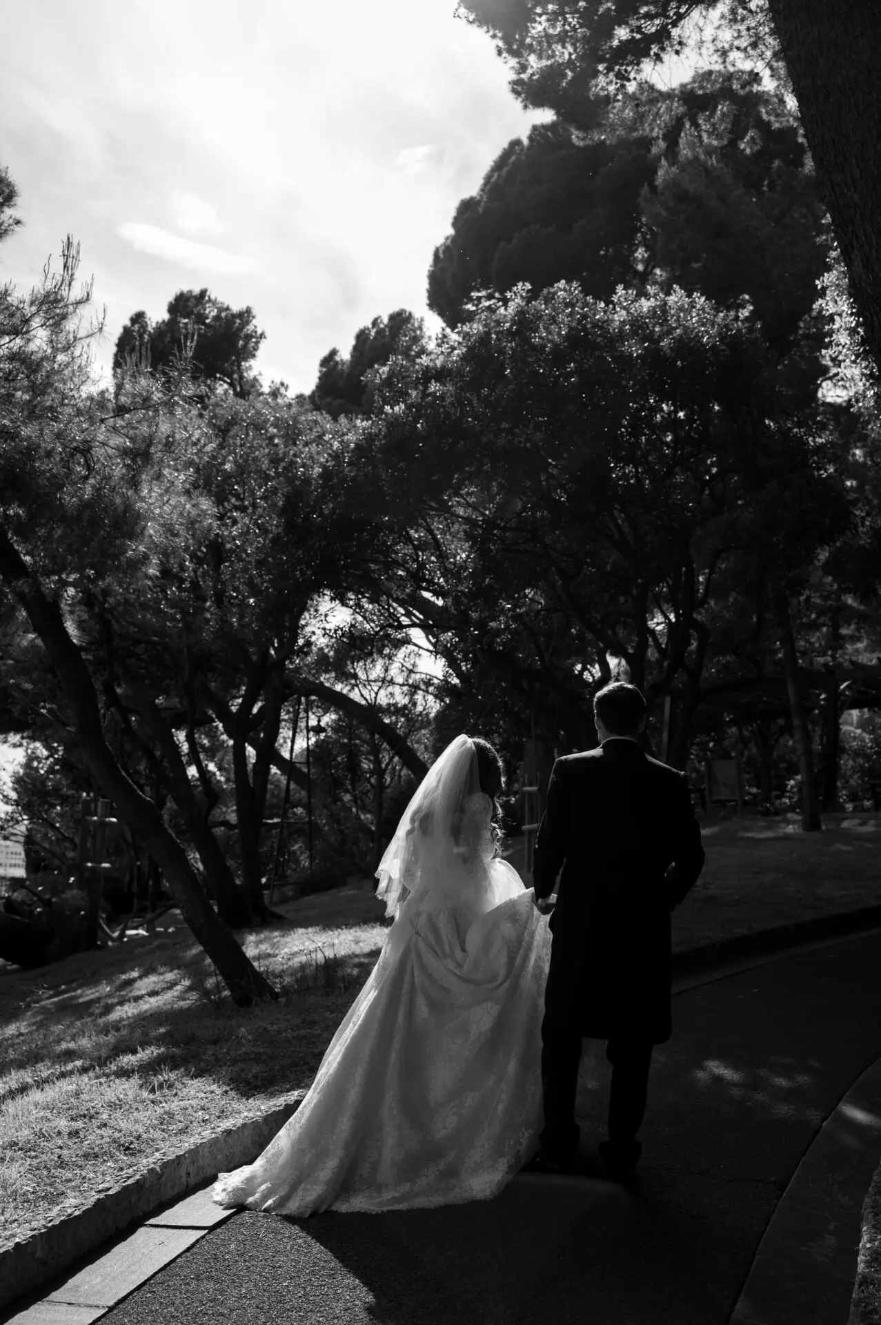 bride and groom walking in the garden
