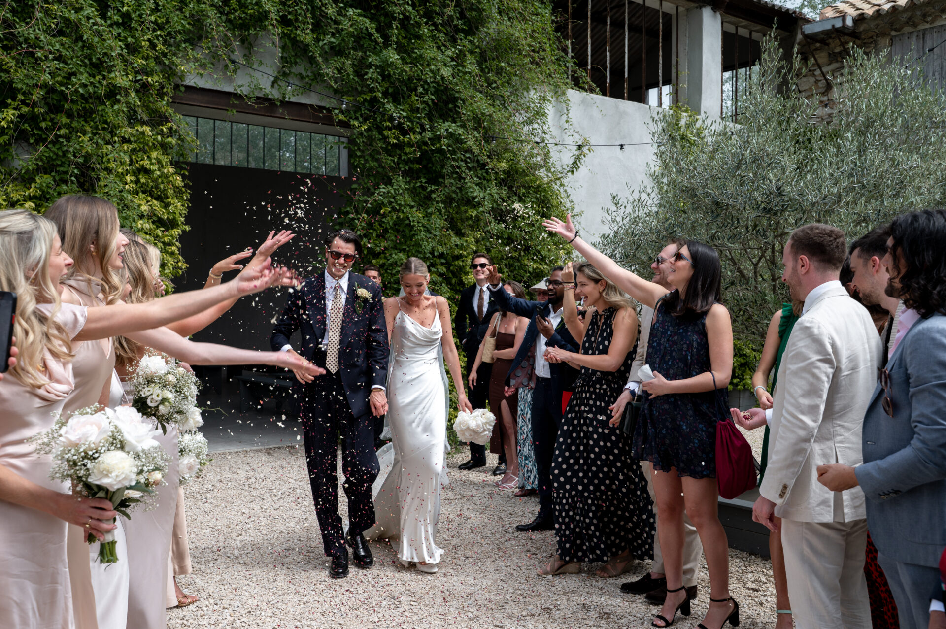 Domaine Blanche Fleur, Provence, Mai 2025 bride and groom exiting their ceremony being married