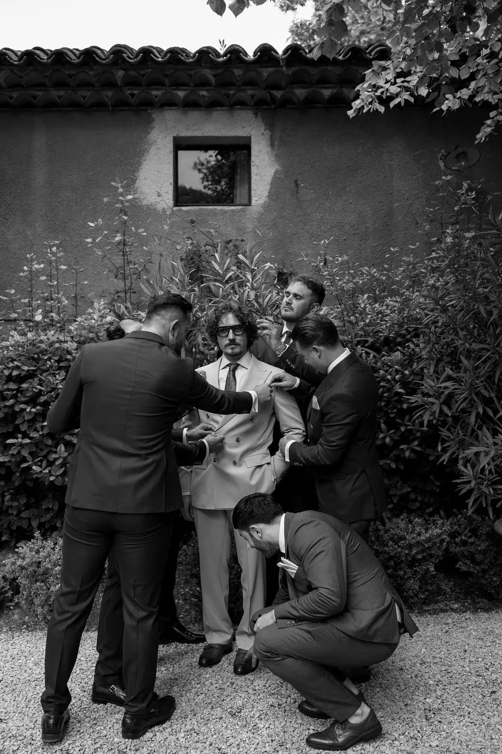 groom and his groomsmen getting ready
