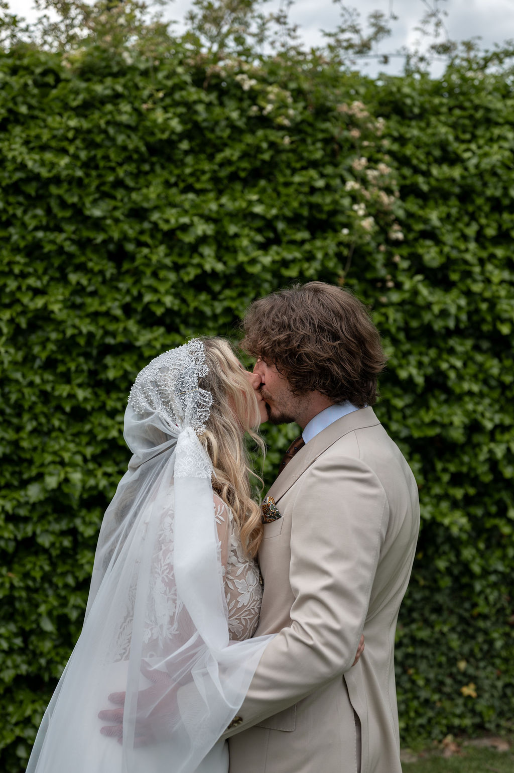 bride and groom kissing