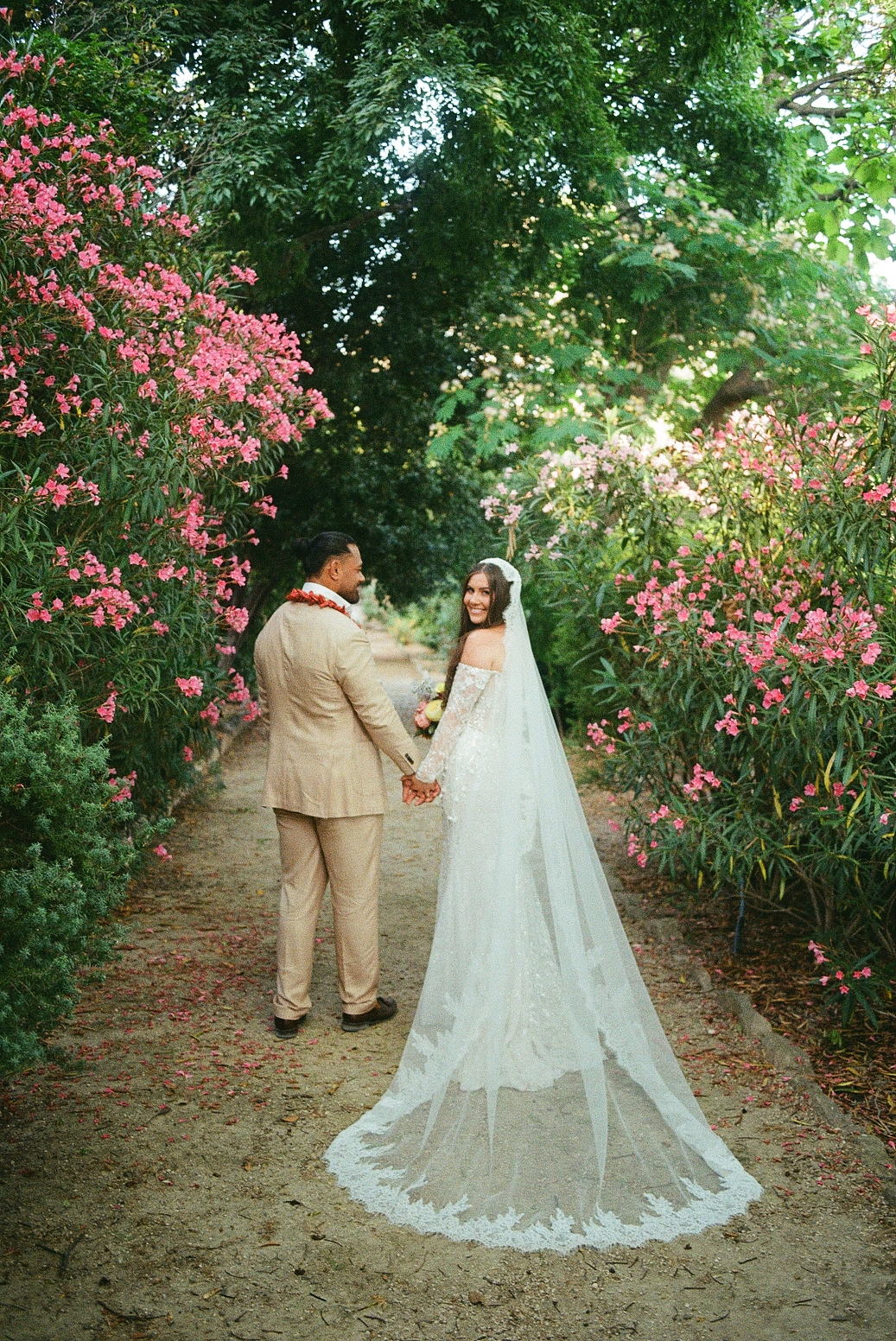 Katie & Jordan's wedding, French Riviera, June 2025 bride and groom holding hands