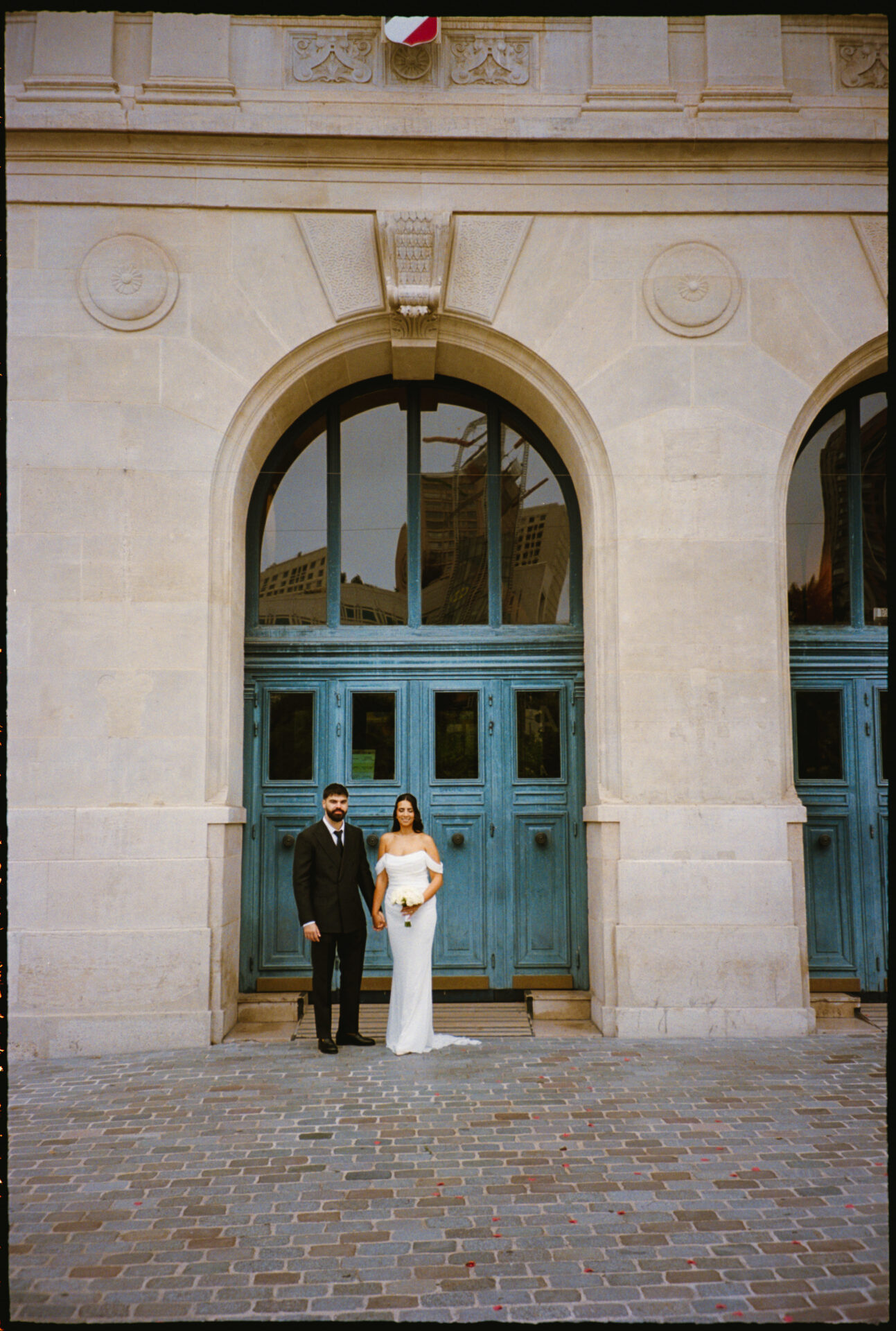 Élodie & Dylan's wedding, Paris, September 2025 bride and groom standing up in front of the city hall
