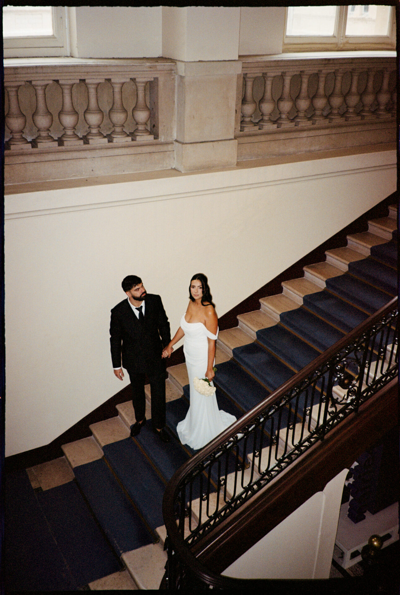 Élodie & Dylan's wedding, Paris, September 2025 bride and groom on the city hall stairs