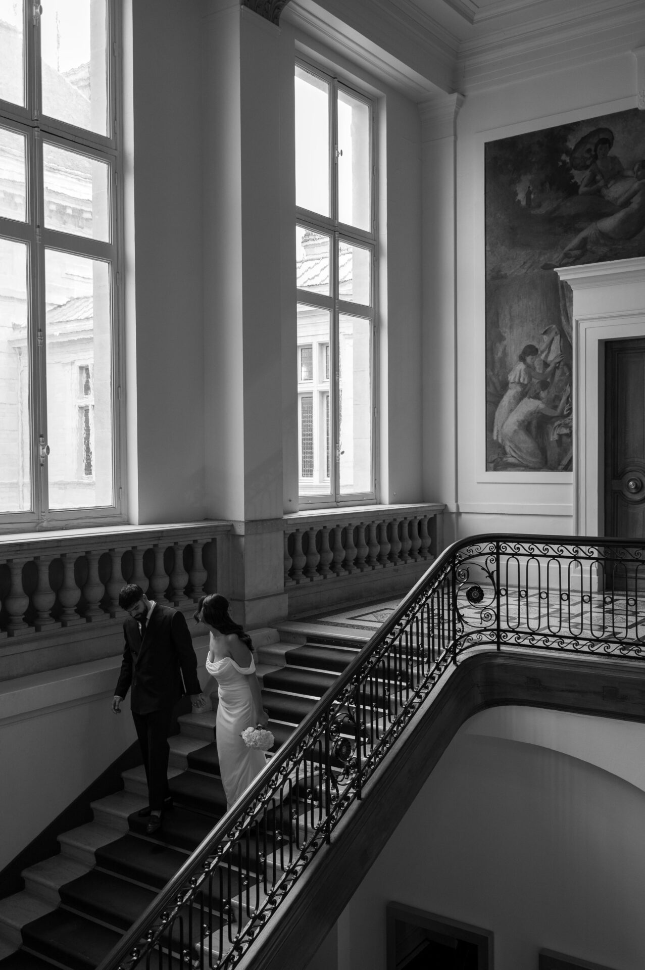Élodie & Dylan's wedding, Paris, September 2025 Bride and groom going down the city hall stairs