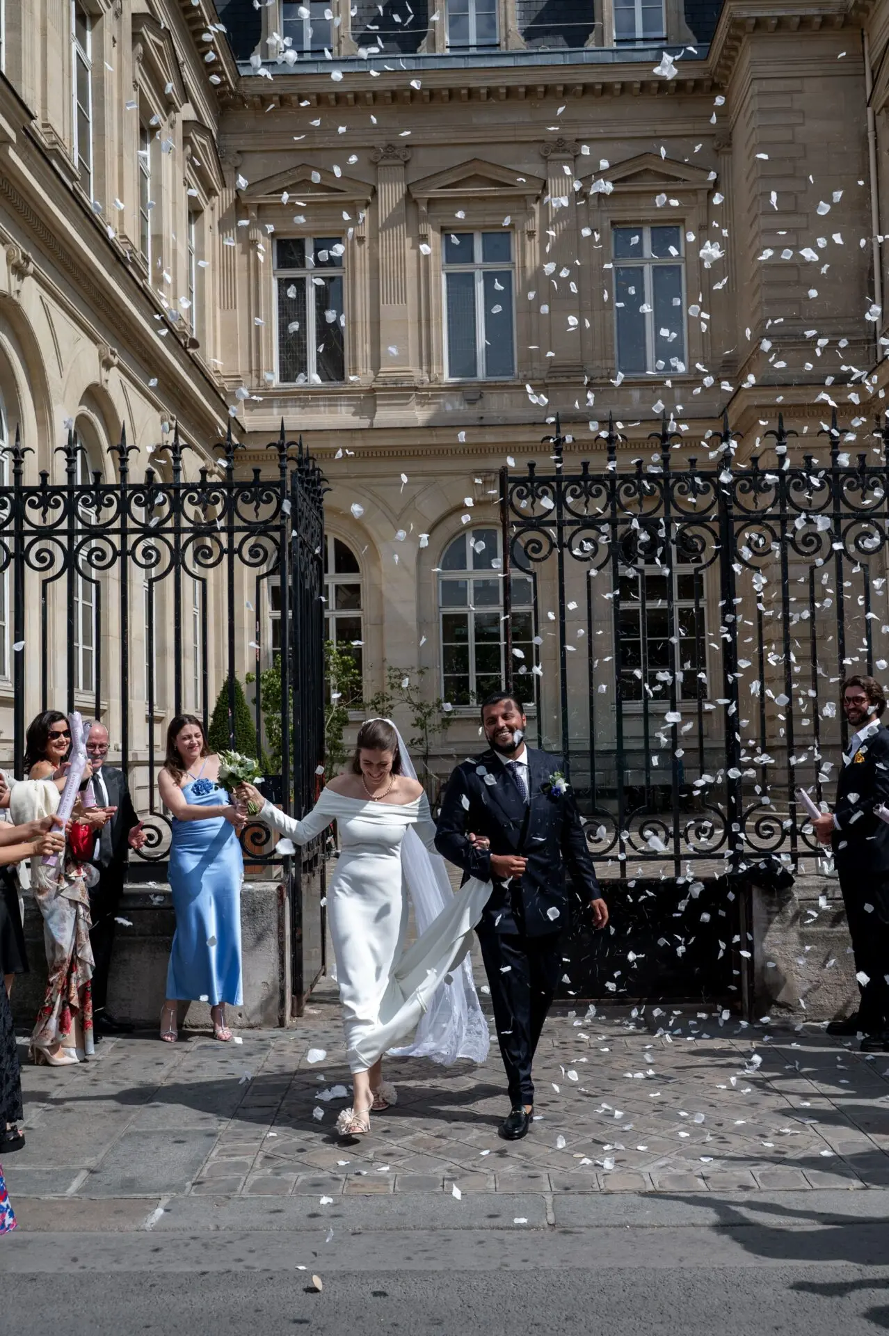 bride and groom celebrating after city hall