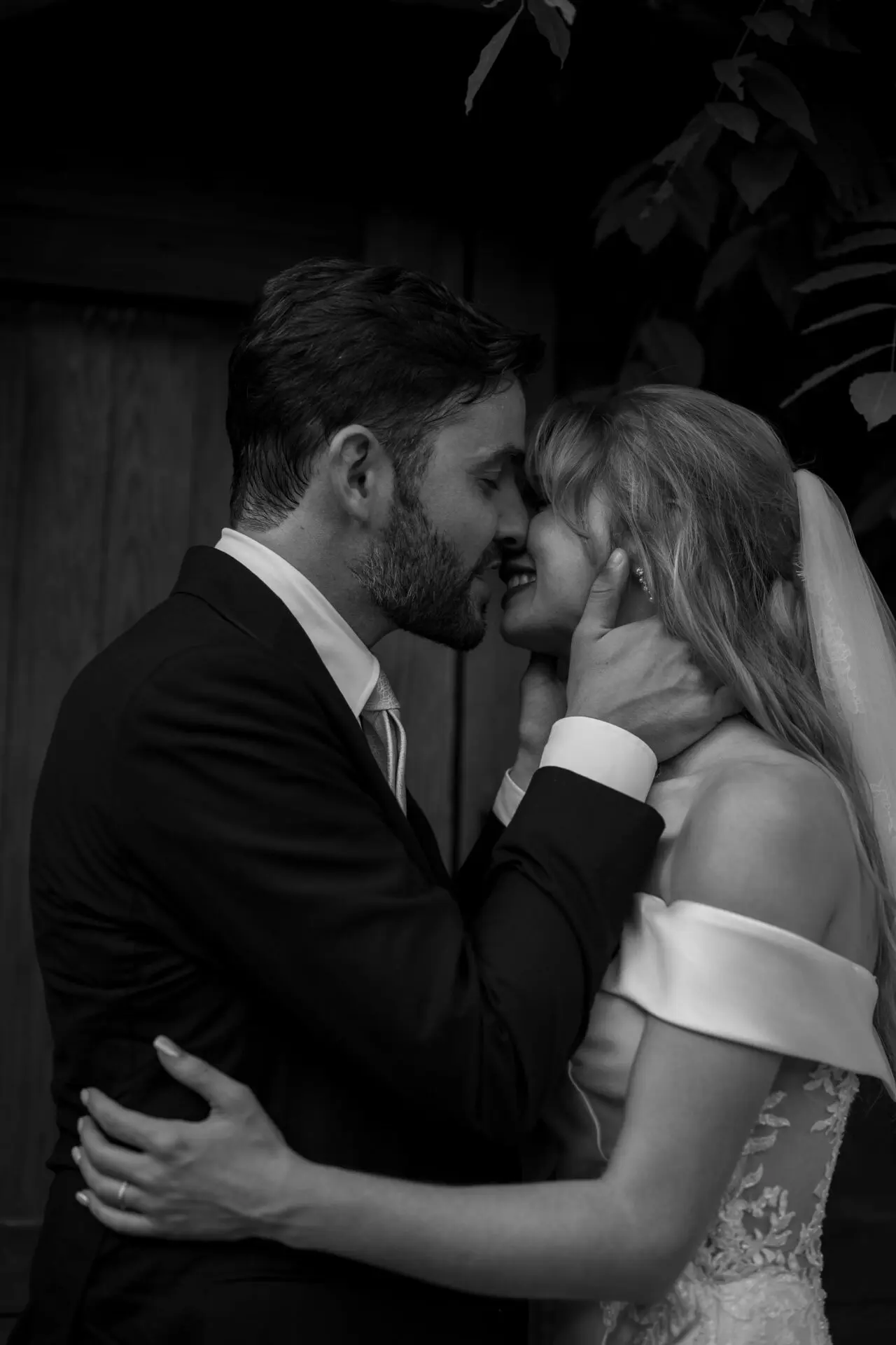 bride and groom kissing with love