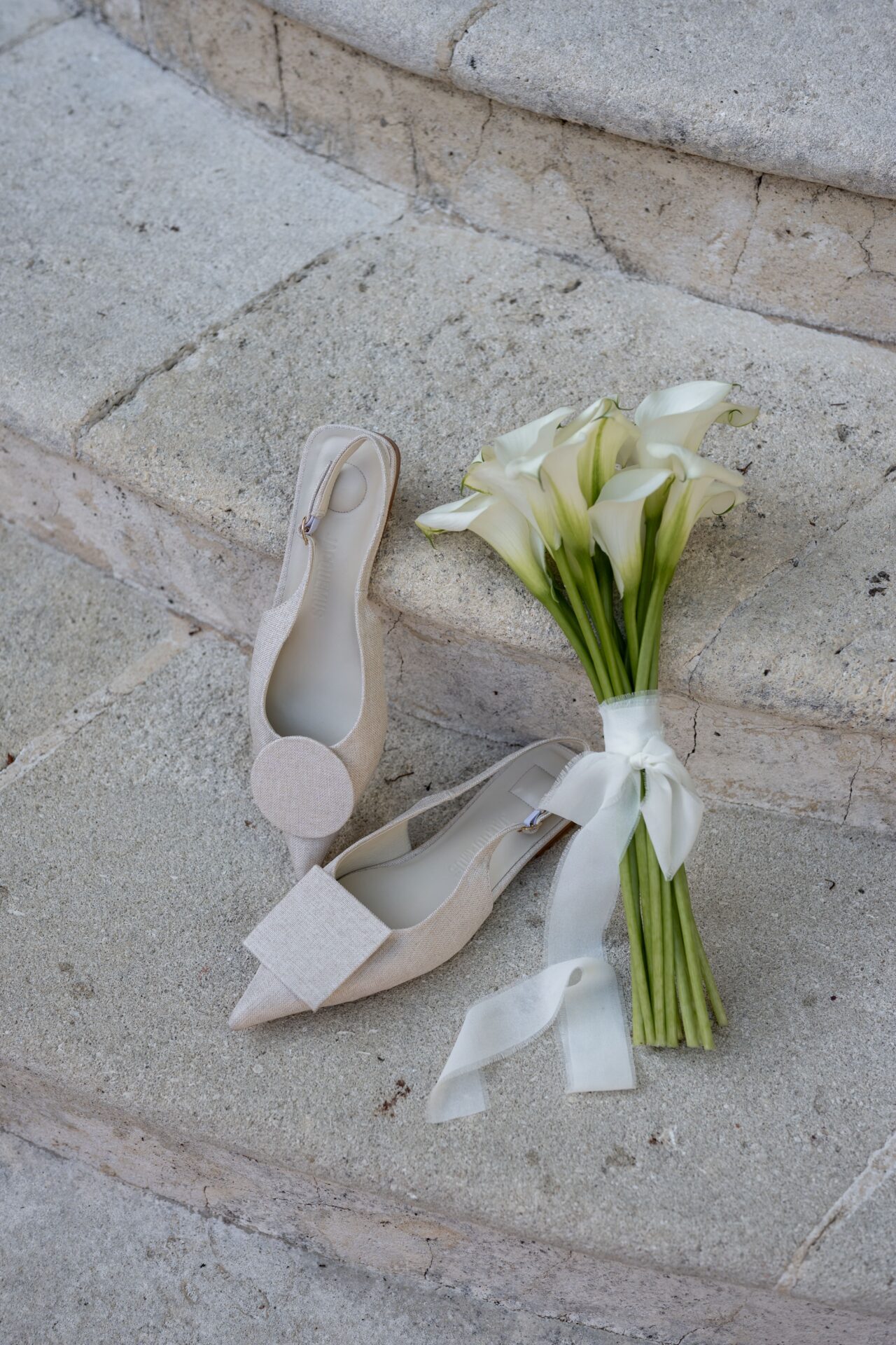 Vivian & Valentin's wedding, September 2025 Jacquemus shoes and flowers on stairs