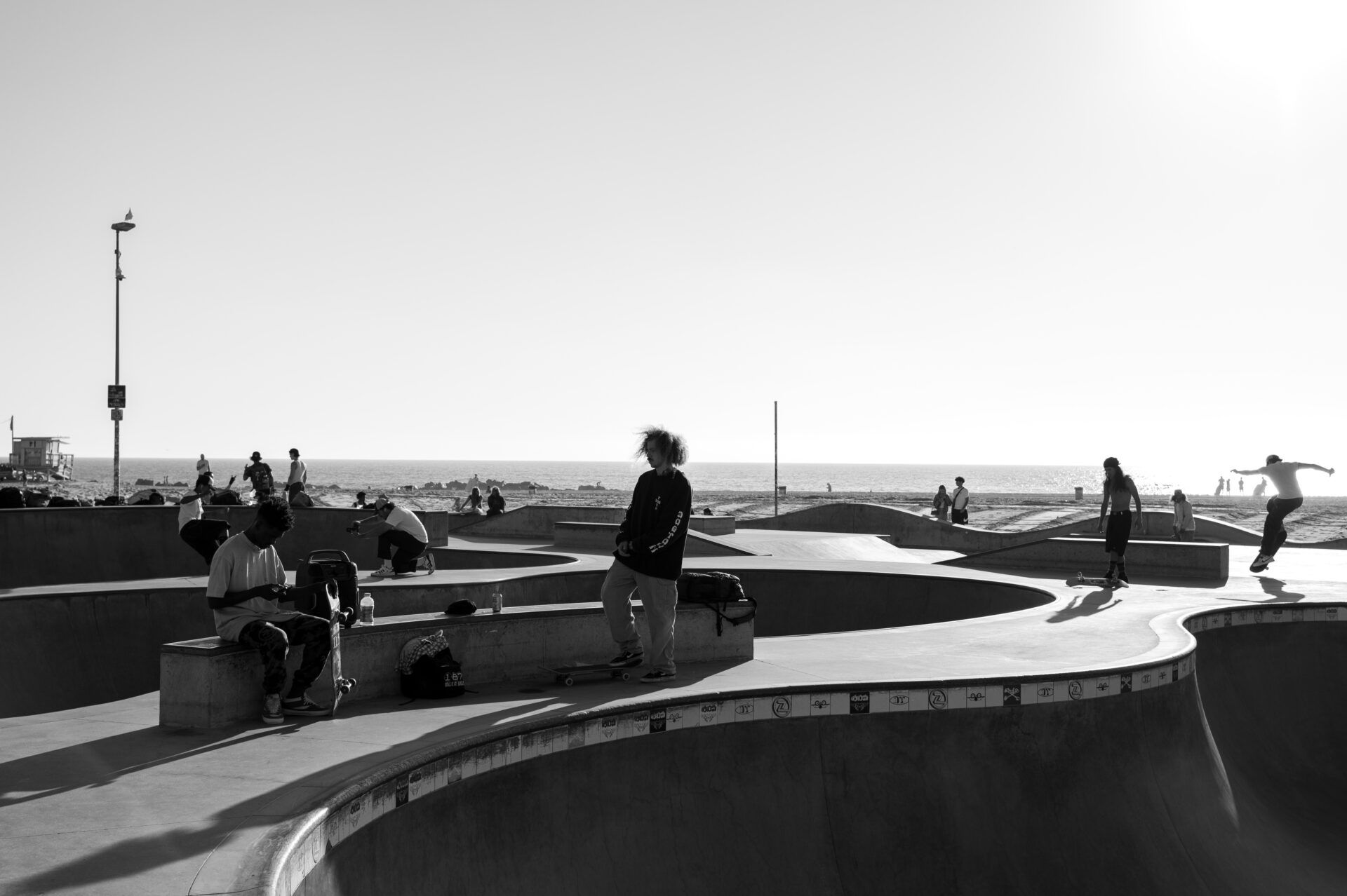 skater in the middle of venice beach bowl