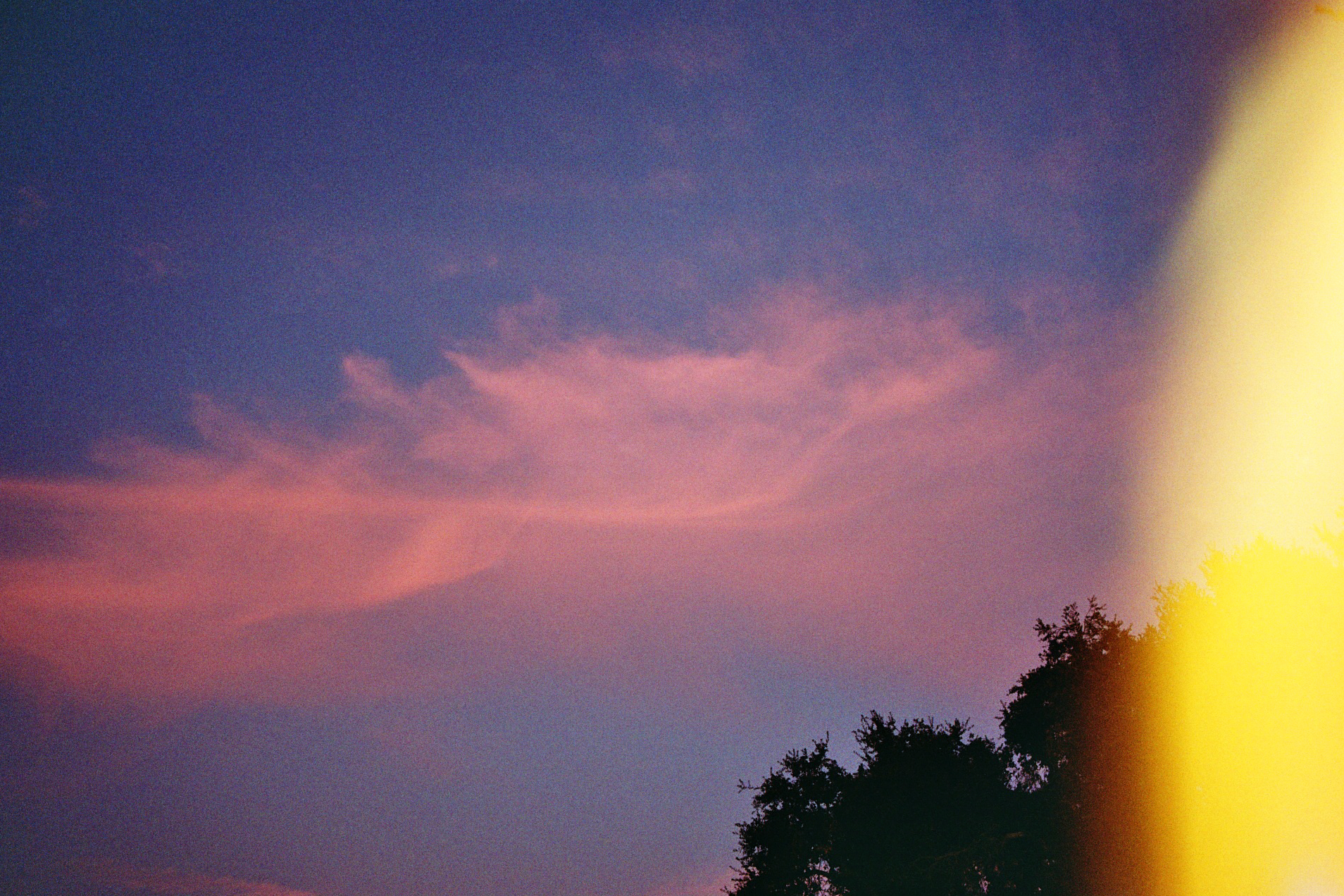 sunset sky with a developpment burnt on the right side