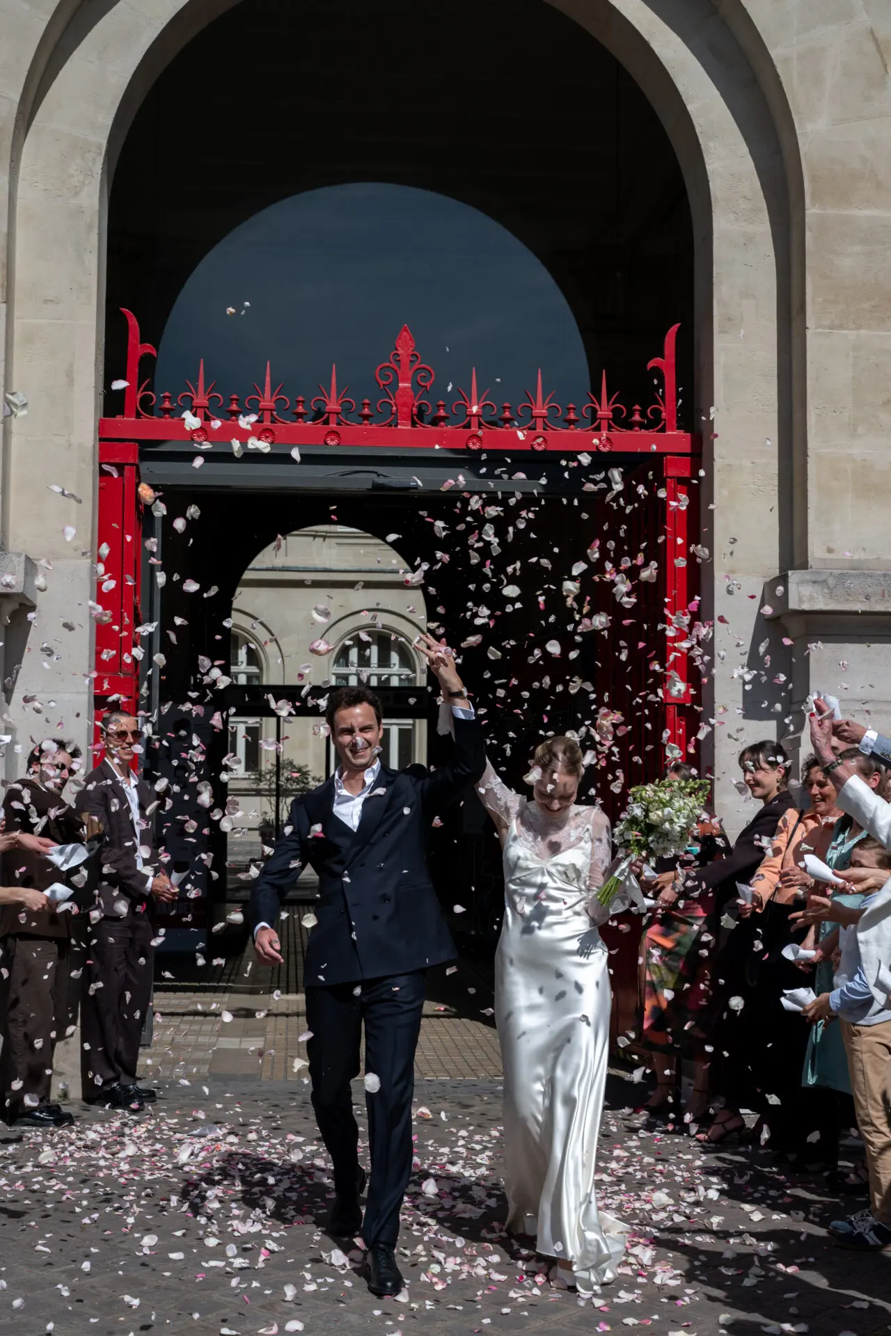 groom holding his bride by the butt
