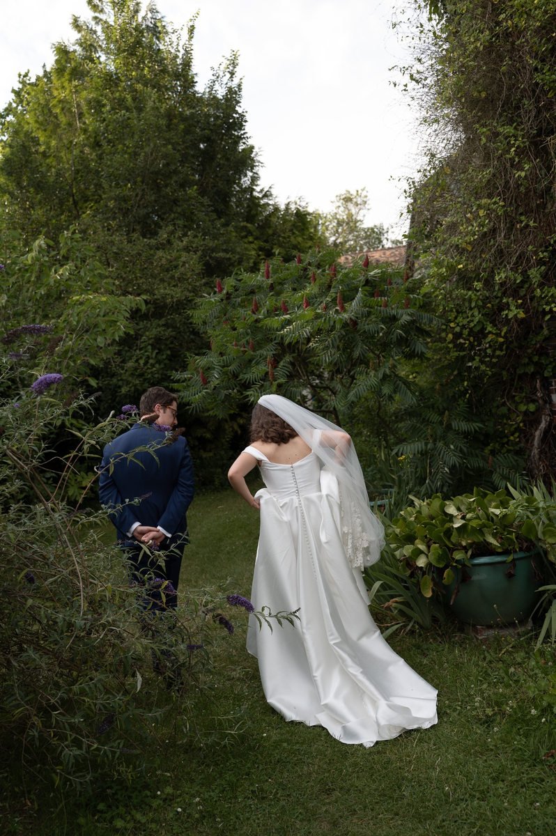 groom being tender with his wife